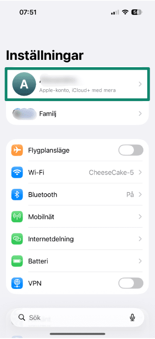 Screenshot showing Apple ID in the iPhone Settings menu