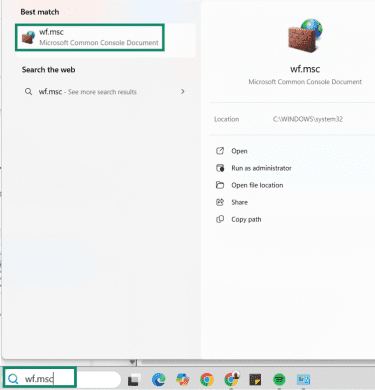 wf.msc is typed in the Windows search bar.