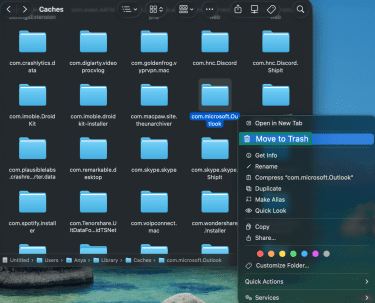 Moving Microsoft Outlook cache folder to Trash on Mac.